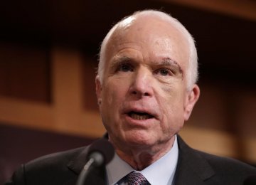 McCain Suggests Trump Dodged Military Draft