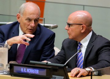 US Chief of Staff Kelly (L) and National Security Adviser McMaster