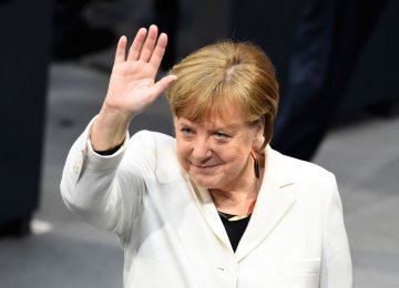 Merkel Narrowly Elected to Fourth Term as German Chancellor