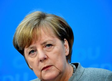 Merkel Resumes Talks to End Political Stalemate