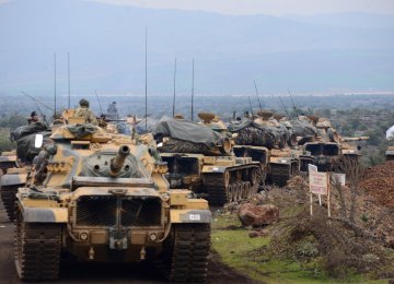 Turkish tanks in a current military campaign against a Kurdish enclave in the northwest Syrian region of Afrin.