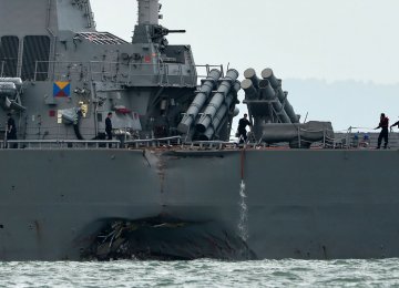 On Monday, the destroyer USS John S. McCain and an oil tanker collided off Singapore, injuring five sailors and leaving 10 others missing.