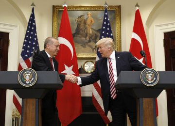 Recep Tayyip Erdogan (L) and Donald Trump shake hands at the White House, USA, on May 17.