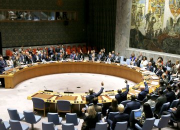 The United Nations Security Council votes to pass a new sanctions resolution against North Korea during a meeting at UN headquarters on Sept. 11