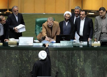 President Hassan Rouhani (foreground) presented the 10.85-quadrillion-rial ($280.6 billion) budget bill early December. 