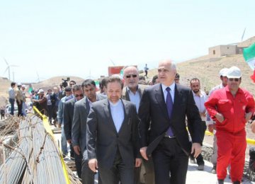 Iran’s former minister of communications and information technology, Mahmoud Vaezi (L), and Azerbaijan’s Economy Minister Shahin Mustafayev visited the site of Rasht-Qazvin Rail Project in May. (File Photo)