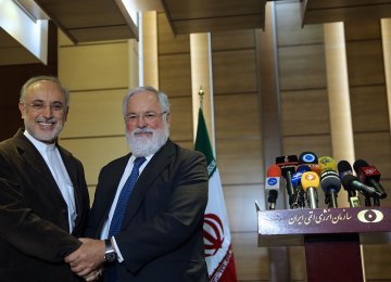  Meeting with Iran’s atomic chief Ali Akbar Salehi (L), EU Commissioner Miguel Arias-Canete echoed the block’s mantra that it is “fully committed” to the 2015 deal and expects the same from all other parties.
