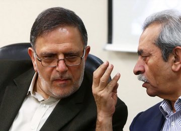 Valiollah Seif (L) and Gholamhossein Shafei 