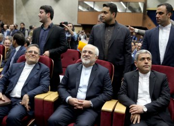 From left :Valiollah Seif, Mohammad Javad Zarif and Ali Tayyebnia at FINEX 2017 in Tehran on April 15.