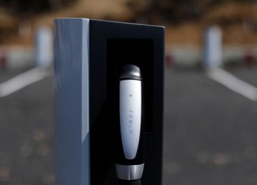 GM Embraces Tesla's EV Supercharging System | Financial Tribune