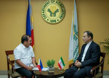 Iranian Ambassador to the Philippines Mohammad Tanhaei (R) met with Filipino Agriculture Secretary Emmanuel F. Pinol on Friday.