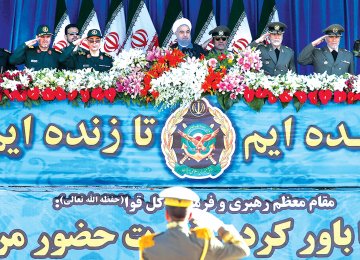 President Hassan Rouhani (top-C) attends a parade on the occasion of Army Day, on April 18, in Tehran.