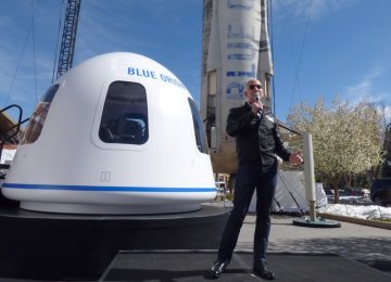 Blue Origin founder Jeff Bezos discusses the status of the company’s New Shepard suborbital vehicle. (File Photo)