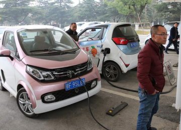 China Fossil Fuel Deadline Shifts Focus to Electric Cars