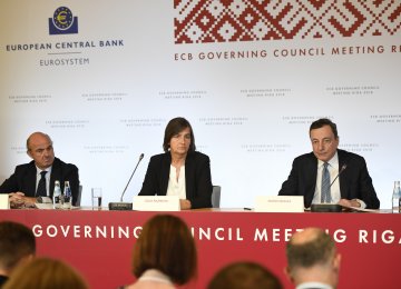 ECB Chief Mario Draghi (R) at the latest ECB press conference.