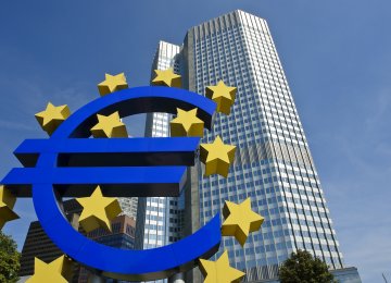 The ECB plans to stop adding to its  bond-buying program by the end of this year.