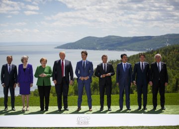 From left: Donald Tusk, Theresa May, Angela Merkel, Donald Trump, Justin Trudeau, Emmanuel Macron, Shinzo Abe, Giuseppe Conte, and Jean-Claude Juncker  during the G7 Leaders Summit in Canada on June 8.