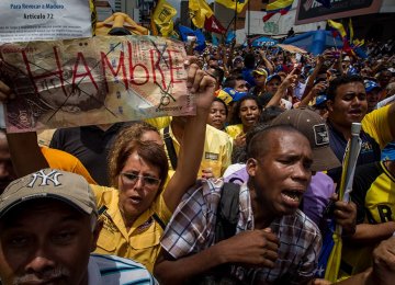 Chaos in Venezuela as Shops Ordered to Cut Prices