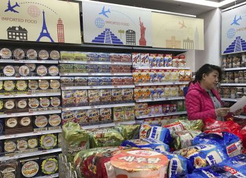 China Cuts Import Tariffs to Lift Consumption  