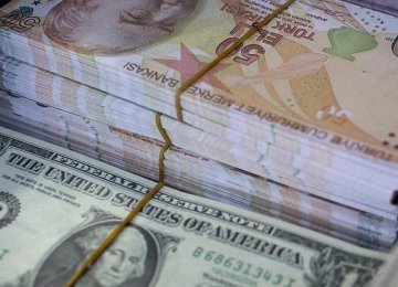 Erdogan’s Monetary Policy Pushes Lira to Record Lows