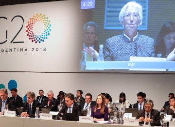 Handout picture shows IMF Managing Director Christine Lagarde on a screen as she speaks  during the G20 meeting taking place in Buenos Aires, on July 21.