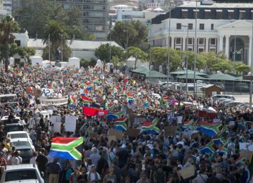 Protesters call for the president to step down on April 7, in Cape Town. 