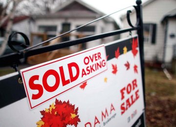 OECD Concerned About Canada’s Mounting Household Debt  