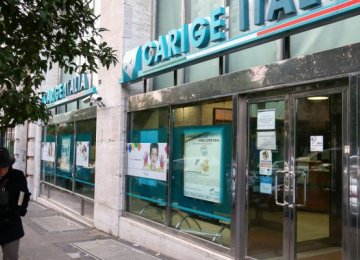 ECB has told Banca Carige to boost  capital and consider merger.
