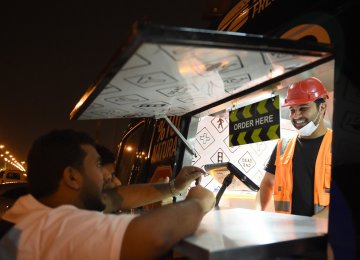 Dishing out burgers and fries slathered with melted cheese, “One Way Burger” is like any other trendy food truck in Riyadh.