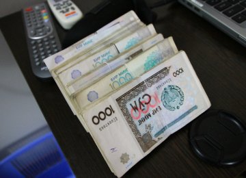 Uzbek Currency Jumps on Black Market Financial Tribune