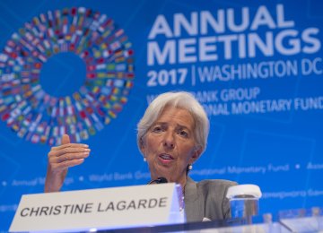 IMF Managing Director Christine Lagarde speaks during a press conference during the World Bank Group / International Monetary Fund Annual Meetings at IMF Headquarters in Washington, DC, October 12.
