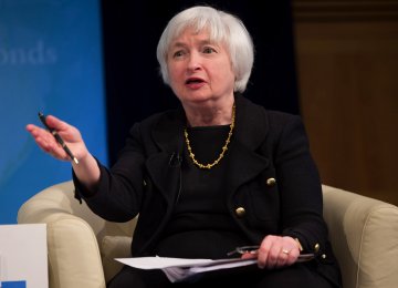 Yellen says economic growth slowed slightly in the  July-September quarter.
