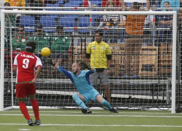 Sadeq Rahimi scoring from the penalty point against France.