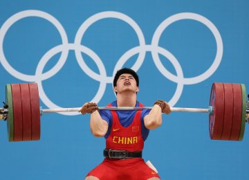 China is among nine countries facing a year’s ban from weightlifting because of doping records.