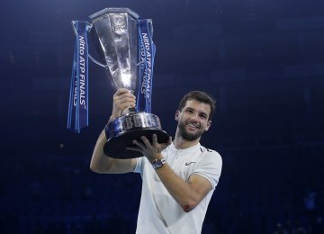 Grigor Dimitrov with the ATP Finals trophy