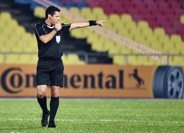 Alireza Faghani started his career in 1994 and became a FIFA referee in 2008.