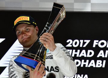 Bottas Forces Hamilton to Settle For Second Place in F1 Finale  