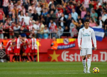 Cristiano Ronaldo looks disappointed after his team  lost to Girona on Monday.