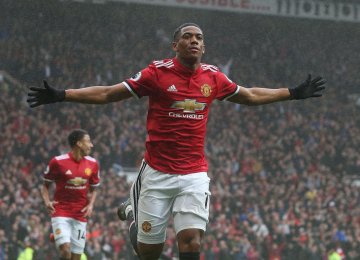 Anthony Martial celebrates after the goal.