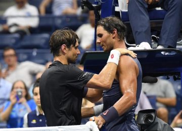 Rafael Nadal (R) and David Ferrer