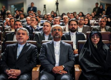 Seyed Reza Salehi Amiri (L), Mohammad Nahavandian (C) and Ashraf Boroujerdi at the ceremony