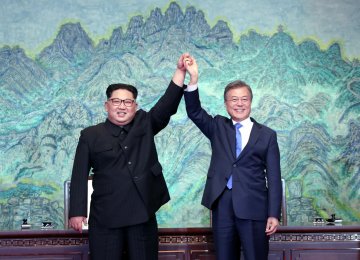 Bach: IOC Opened Door for Koreas Summit