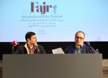 Reza Mirkarimi (R) at the press conference on April 10