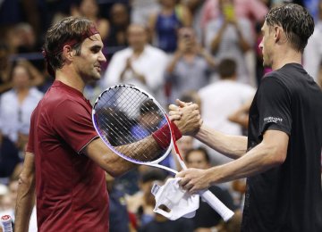 Roger Federer (L) lost to John Millman in the fourth  round of US Open.