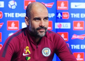 Pep Guardiola Charged for  Wearing Pro-Catalan Ribbon