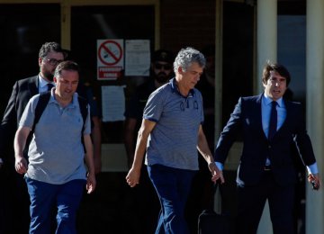 Angel Maria Villar (C) leaves the prison of Soto del Real near Madrid on August 1 after being granted bail.