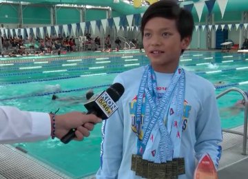 10-Year-Old Swimmer Breaks Record Held by Michael Phelps
