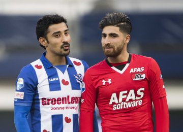 Alireza Jahanbakhsh (R) and Reza Ghoochannejhad both played in the Netherland’s top-flight football league, Eredivise, last season.