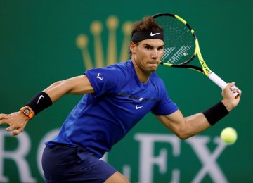 Nadal, Federer Ease Through in Shanghai