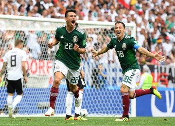 Hirving Lozano (No. 22) of Mexico celebrates his goal against Germany.